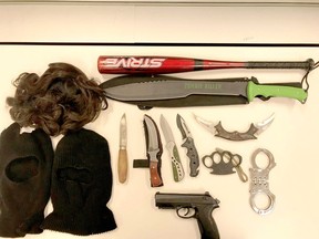Following Albert Fontaine's arrest, a police search of his vehicle located numerous knives, a machete, a baseball bat, a wig, ski-masks, handcuffs, a set of brass knuckles and a "Beretta" airsoft pistol replica firearm.