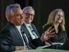 Robert Kennedy Jr., left, during a panel discussion at Globe Forum in Vancouver. Next to him are Wal van Lierop, a leading clean-technology investor and founder of Chrysalix Venture Capital, and Vancity CEO Tamara Vrooman.