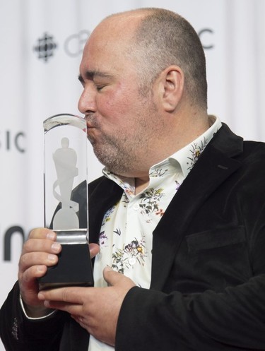 A member of the band MonkeyJunk celebrates the band's Juno for Blues Album of the Year at the Juno Gala Dinner and Awards show in Vancouver, Saturday, March 24, 2018.