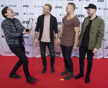 The Color celebrates their Juno for Contemporary Christian/Gospel Album of the Year at the Juno Gala Dinner and Awards show in Vancouver, Saturday, March 24, 2018.