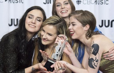 Members of The Beaches celebrate their Juno for Breakthrough Group of the Year at the Juno Gala Dinner and Awards show in Vancouver, Saturday, March 24, 2018.