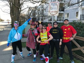 Clinic coordinator Sandra Jongs Sayer, the brainchild of the super heroes training run, strikes a power pose while leading her Vancouver Sun Run InTraining crusaders through the streets of Langley.