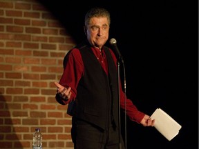 Comedian Mike MacDonald performs his standup act in Montreal in October 2013. MacDonald died Saturday, March 17, 2018 in Ottawa of heart complications at age 62.
