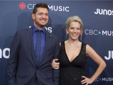 Michael Buble and wife Luisana Lopilato arrive on the red carpet at the Juno Awards in Vancouver, Sunday, March, 25, 2018.