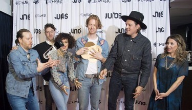 Arcade Fire celebrates their Juno for Album of the year at the Juno Awards in Vancouver, Sunday, March, 25, 2018.