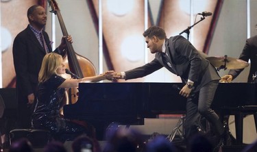 Michael Buble and Diana Krall perform at the Juno Awards in Vancouver, Sunday, March, 25, 2018.