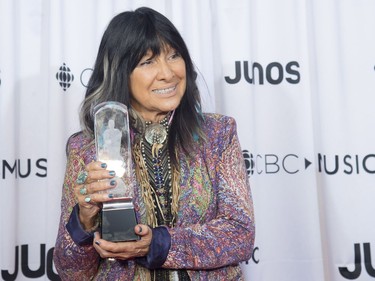 Buffy Sainte-Marie celebrates her Juno for Indigenous Music Album of the Year at the Juno Awards in Vancouver, Sunday, March, 25, 2018.