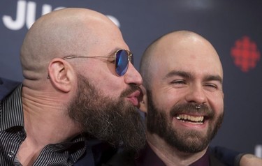 Oli Peters, left, and Dean Lamb, of Archspire, arrives on the red carpet at the Juno Awards in Vancouver, Sunday, March, 25, 2018.