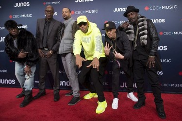 Rappers, from left to right, Thrust, Choclair, Misfit, Kardinal Offishal, Checkmate and Red1, of "Northern Touch" fame, arrive on the red carpet at the Juno Awards in Vancouver, Sunday, March, 25, 2018.