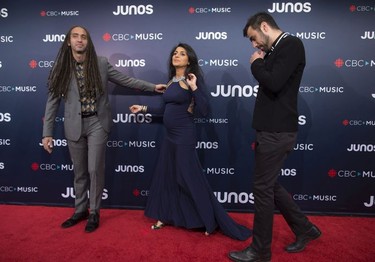 Sultan, left, and bandmate Shepard, of Sultan+Shepard, arrive on the red carpet at the Juno Awards in Vancouver, Sunday, March, 25, 2018.