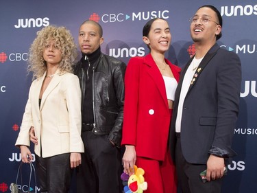 Kevin Yazdani, right, and Sean Brown, second from left, arrive on the red carpet at the Juno Awards in Vancouver, Sunday, March, 25, 2018.