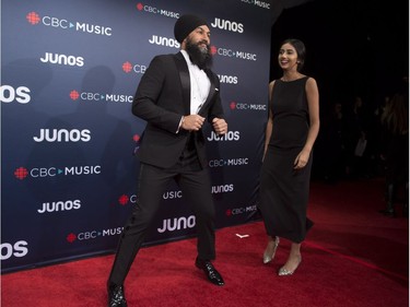 Federal NDP Leader Jagmeet Singh and Gurkiran Kaur arrive on the red carpet at the Juno Awards in Vancouver, Sunday, March, 25, 2018.