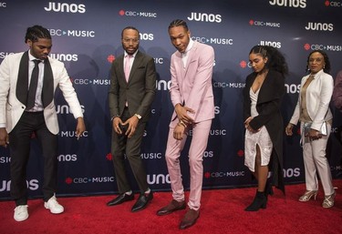 Clairmont the Second, centre, is seen during arrivals for the 2018 Juno Awards, in Vancouver on Sunday, March 25, 2018.