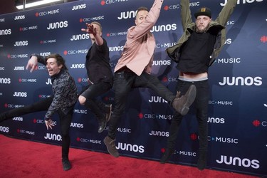 Members of the band The Color arrive on the red carpet at the Juno Awards in Vancouver, Sunday, March, 25, 2018.