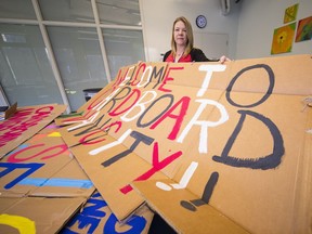 Nicki McGregor with a "cardboard city" to be used for a homeless youth fundraiser.