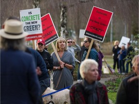 People protest bike paths in an anti-Kits beach bike lane rally in Vancouver, BC, March 12, 2018.