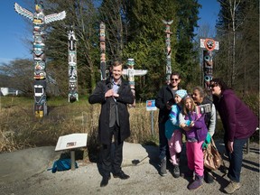 Tourism Vancouver president and CEO Ty Speer ‘crashes’ some visitors’ family selfie (right) in front of the famous totem poles in Stanley Park this week. ‘We’ve known for a couple of years that 2018 is shaping up as our best year ever for events,’ he says.