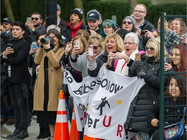 Fans watch celebrities arrive for the 2018 Juno Awards at Rogers Arena in Vancouver, March 25, 2018.