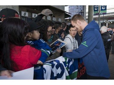 Vancouver Canucks Henrik Sedin meets with fans prior to their NHL game against the Columbus Blue Jackets in Vancouver, BC, March, 31, 2018.