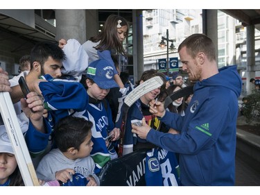 Vancouver Canucks Henrik Sedin meets with fans prior to their NHL game against the Columbus Blue Jackets in Vancouver, BC, March, 31, 2018.
