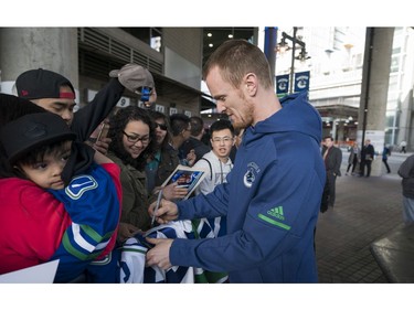 Vancouver Canucks Henrik Sedin meets with fans prior to their NHL game against the Columbus Blue Jackets in Vancouver, BC, March, 31, 2018.