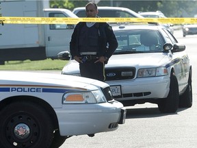 Richmond RCMP at the scene of the death of Redelma Belissario on Woodhead Road in Richmond in May of 2015. Belissario’s son, Darwin Lescano, was found guilty of second-degree murder on Tuesday.