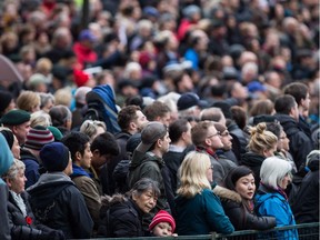 A large crowd in Vancouver reflects the city's ethnic mix.