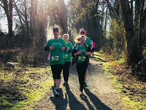 Team Feelin' Lucky runs together at Burnaby Lake Sunday morning for the annual Shamrock 'N' Race 5K, 7-Miler and Half Marathon. The event staged by Try Events attracted 377 participants, many of them in green-themed attire.