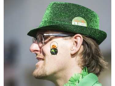 Adrian Polley sports a pot of gold on his cheek as he attends the St. Patrick's Day party at the Blarney Stone, Vancouver, March 17 2018.