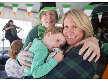 Brendan Mulhall attends the St. Patrick's Day party at the Blarney Stone with his daughter Laoise Mulhall and his granddaughter Caoilinn Hanna  Vancouver, March 17 2018.