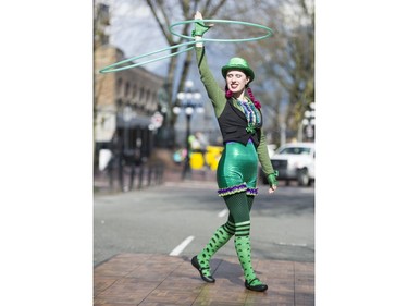 Ariel Amara leads a hulu hoop session at the St. Patrick's Day party at the Blarney Stone, Vancouver, March 17 2018.