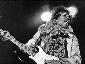 In this June 18, 1967 file photo, Jimi Hendrix performs at the Monterey Pop Festival in Monterey, Calif.