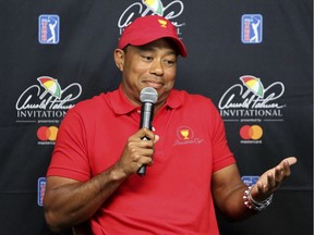 Tiger Woods’s fortunes — and golf’s — are revived in the wake of last weekend’s second-place showing at the Valspar Championships. Here a loose Woods shrugs during a news conference on Tuesday at Bay Hill in Orlando, Fla. (Photo: Joe Burbank, Orlando Sentinel via Associated Press)