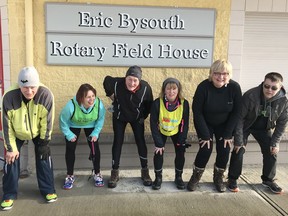 Some of the participants in the Langley Sun Run InTraining clinic ham it up for a photo before their Saturday morning workout at McLeod Athletic Park.