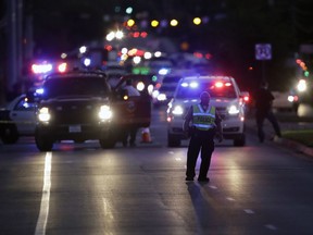 Emergency vehicles stage near the site of another explosion, Tuesday, March 20, 2018, in Austin, Texas.