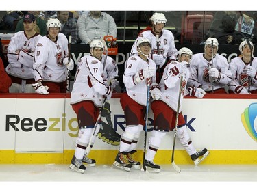 JANUARY 30, 2011:  Team Staal players Ryan Kesler #17 of the Vancouver Canucks, Alexander Ovechkin #8 of the Washington Capitals and Daniel Sedin #22 of the Vancouver Canucks reacts with their team in the third period against Team Lidstrom in the 58th NHL All-Star Game at RBC Center on January 30, 2011 in Raleigh, North Carolina.