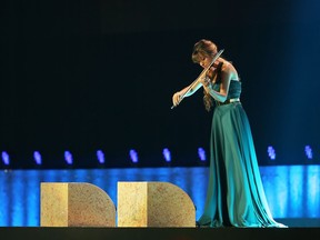 Scottish violinist Nicola Benedetti, shown performing during the opening ceremony for the Glasgow 2014 Commonwealth Games in 2014, returns to Vancouver on Sunday as part of the  Benedetti Elschenbroich Grynyuk Trio.