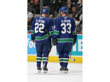 APRIL 23 2007:  Daniel and Henrik skate on the ice against the Dallas Stars during Game 7 of the 2007 Western Conference Quarterfinals at GM Place. The Canucks won 4-1 to win the series 4-3.