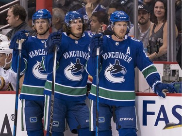 NOVEMBER 16, 2017: Henrik Sedin #33, Loui Eriksson #21 and Daniel Sedin #22 of the Vancouver Canucks in NHL action against the Vegas Golden Knights.