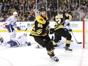 David Pastrnak of the Boston Bruins celebrates after scoring a goal against the Toronto Maple Leafs during the third period of Game 7 at TD Garden on April 25, 2018