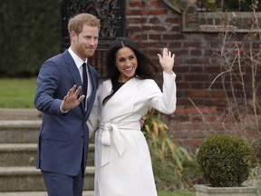 Britain's Prince Harry and his fiancee Meghan Markle pose for photographers during a photocall in the grounds of Kensington Palace in London, Monday Nov. 27, 2017. John Muscat was asleep on Nov. 27, when he became intertwined with a historical moment that will be remembered for decades, if not centuries. Having hosted his annual Christmas bash the night before and planned to go into work late the next day, the Toronto-based fashion designer woke up to find dozens of calls alerting him that Britain's Prince Harry had announced his engagement that morning to Suits star Meghan Markle, clad in a white wrap coat from the knitwear Line The Label brand Muscat co-founded.