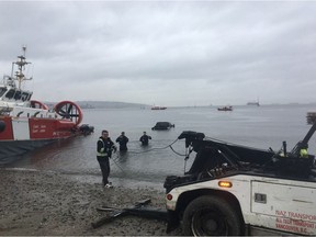 A mysterious sight appeared at Vancouver's Kitsilano Beach on Thursday afternoon when the low tide revealed a stolen truck in the water.