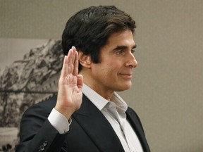 Illusionist David Copperfield is sworn in during court Wednesday, April 18, 2018, in Las Vegas.