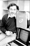 Prof. Hanna Kassis at the University of B.C. in the early 1980s, with his book on the Qur’an.