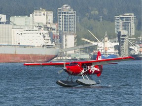 The first ceremonial seaplane flight between Vancouver and Seattle lands in Vancouver's inner harbour carrying Navdeep Bains, Canada's Minister of Innovation, Science and Economic Development; Alan Winter, Innovation Commissioner for B.C.; and Vancouver Mayor Gregor Robertson on April 25.