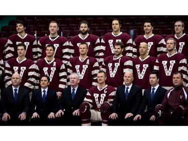 Vancouver Canucks players, including team captain Henrik Sedin, bottom centre, of Sweden, wear replica Vancouver Millionaires uniforms while posing for a team photograph in Vancouver, B.C., on Friday March 1, 2013. The team will sport the uniforms during their NHL hockey game against the Detroit Red Wings on March 16. The Millionaires played in the Pacific Coast Hockey Association and the Western Canada Hockey League between 1911 and 1926.