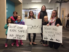 Walnut Grove residents went to a recent TransLink board of directors meeting to show their opposition to the Township of Langley's plan to designate 216th Street a truck route. Geraldine Jordan is on the far right.