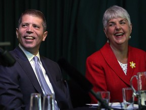 Andrew Kriegler, president of the Investment Industry Regulatory Organization of Canada, and Finance Minister Carole James at an event in Friday Victoria to announce new powers for industry self-regulatory bodies to enforce monetary penalties.