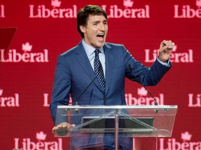 Prime Minister Justin Trudeau delivers a speech at the Liberal Party convention in Halifax on Saturday, April 21, 2018. (Darren Calabrese/Canadian Press)