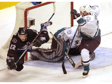 Feb. 14, 2004: Daniel Sedin flies past Mighty Ducks of Anaheim goalie Jean-Sebastien Giguere and defenceman Niclas Havelid at GM Place.